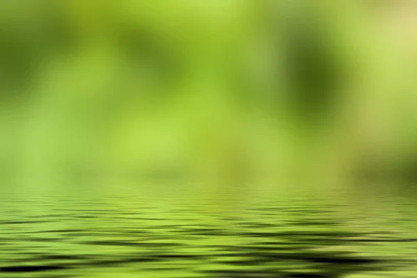 Desenfoque de fondo con reflejo de agua — Foto de Stock