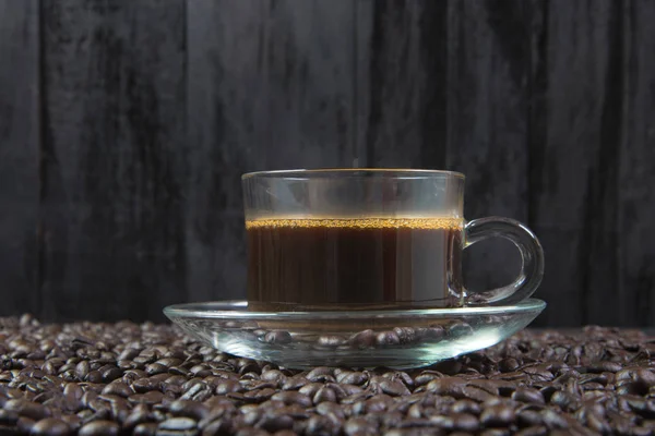 Espresso bir cam ahşap tablo