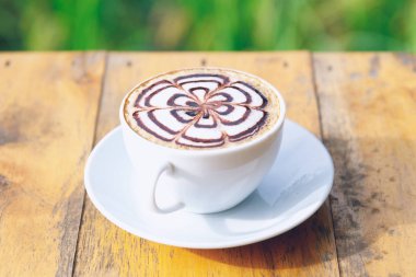 Tablo içinde alan manzaralı kafe salonu kahve fincanı