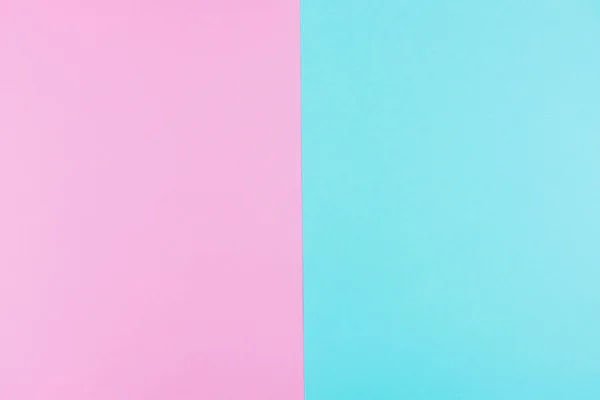 Blue paper background with pink