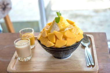 Bingsu (Kore Gıda) mango şekerli yoğunlaştırılmış süt ile görev yaptı.