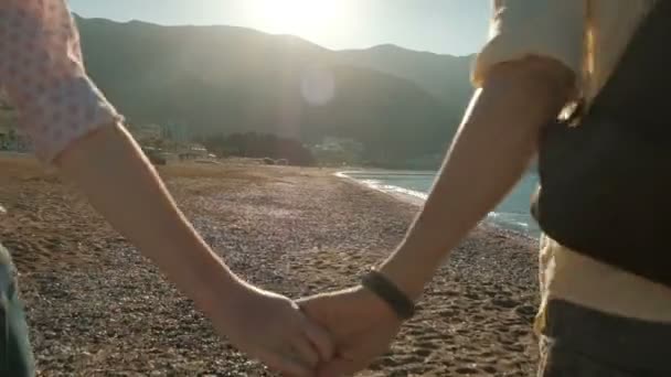 Man and woman run along stony bank in summer morning. — Stock Video