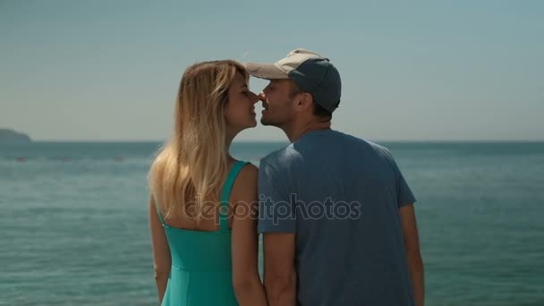 Couple on photo shoot on seaside walking, kissing, enjoy moments — Stock Video