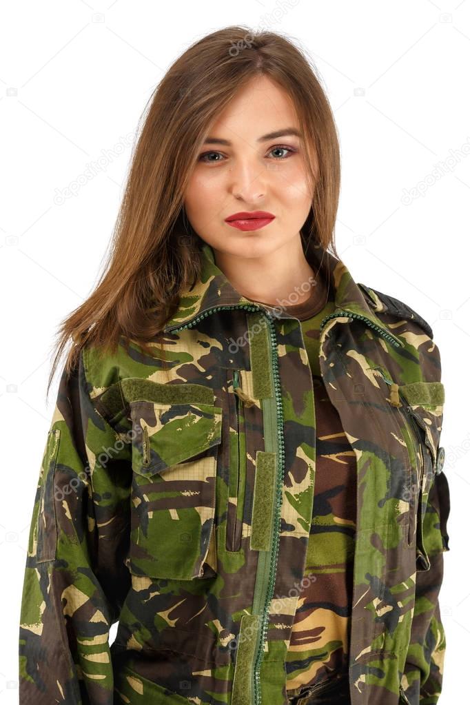 beautiful young woman soldier in military camouflage outfit