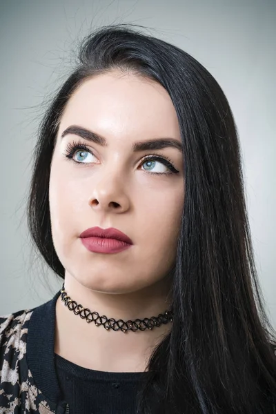 Portrait of a brunette with beautiful eyes in the studio — Stock Photo, Image