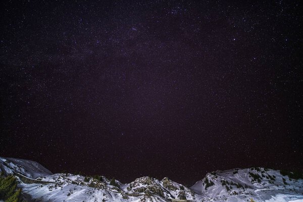 Sky night with stars in the mountains during the winter