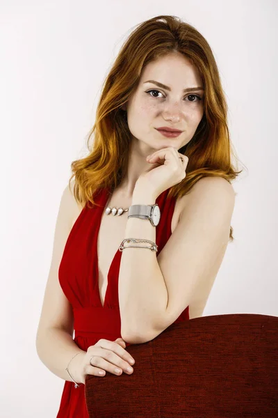 Portrait of a beautiful woman with red hair and freckles — Stock Photo, Image