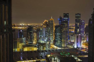 View over Doha downtown illuminated at night. January 15,2020 in