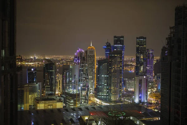 View over Doha downtown illuminated at night. January 15,2020 in — Stock Photo, Image