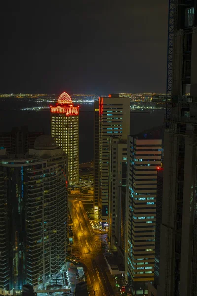 View over Doha downtown illuminated at night. January 15,2020 in — Stock Photo, Image