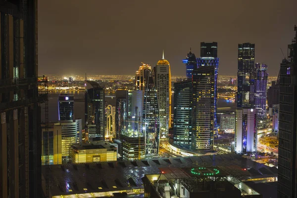 View over Doha downtown illuminated at night. January 15,2020 in — Stock Photo, Image