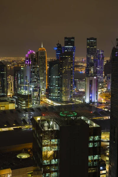 View over Doha downtown illuminated at night. January 15,2020 in — Stock Photo, Image