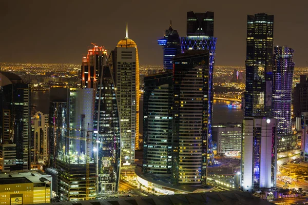 View over Doha downtown illuminated at night. January 15,2020 in — Stock Photo, Image