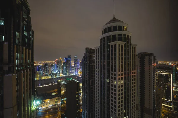 View over Doha downtown illuminated at night. January 15,2020 in — Stock Photo, Image