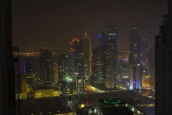 View over Doha downtown illuminated at night. January 15,2020 in — Stock Photo, Image