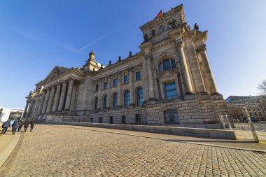 BERLIN, BERLIN / GERMANIA - February 7, 2020: Tourists visit the glass dome on the Reichstag. It was designed by architect Norman Foster and built to symbolize the reunification of Germany.