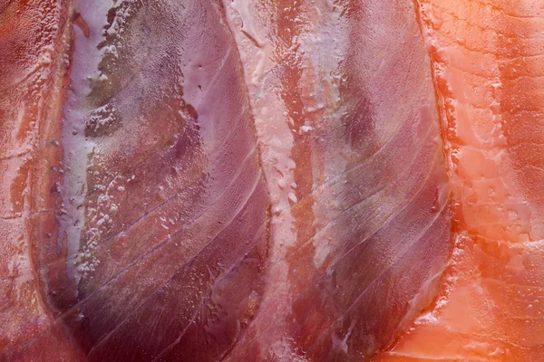 Slices of fatty smoked fish — Stock Photo, Image