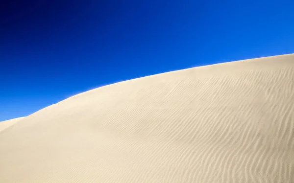 Zand en wind patroon op duinen — Stockfoto