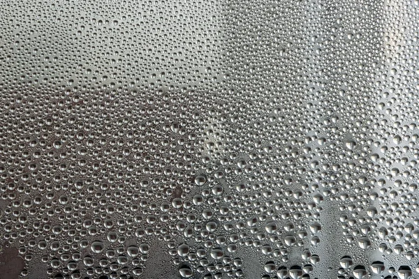 Abstract background  of water drops on the glass surface — Φωτογραφία Αρχείου