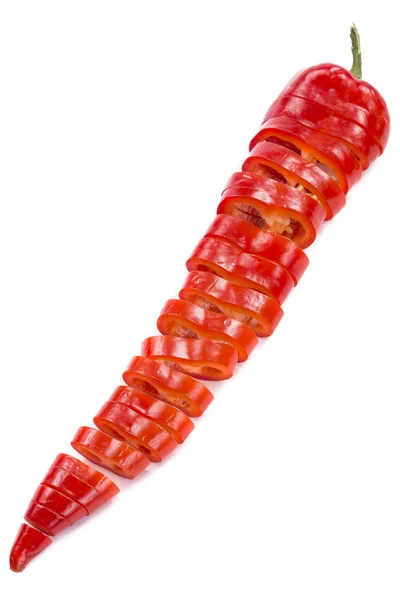 Peperoncino rosso affettato su fondo bianco — Foto Stock