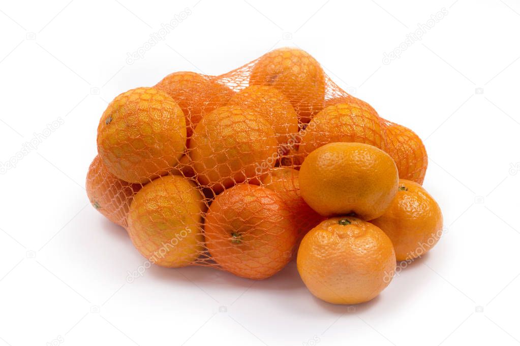 Ripe orange tangerines in the grid