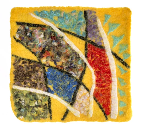 De mat van Gevilte wol met een abstracte patroon — Stockfoto