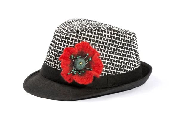 Un sombrero con una flor de lana llena sobre un fondo blanco —  Fotos de Stock
