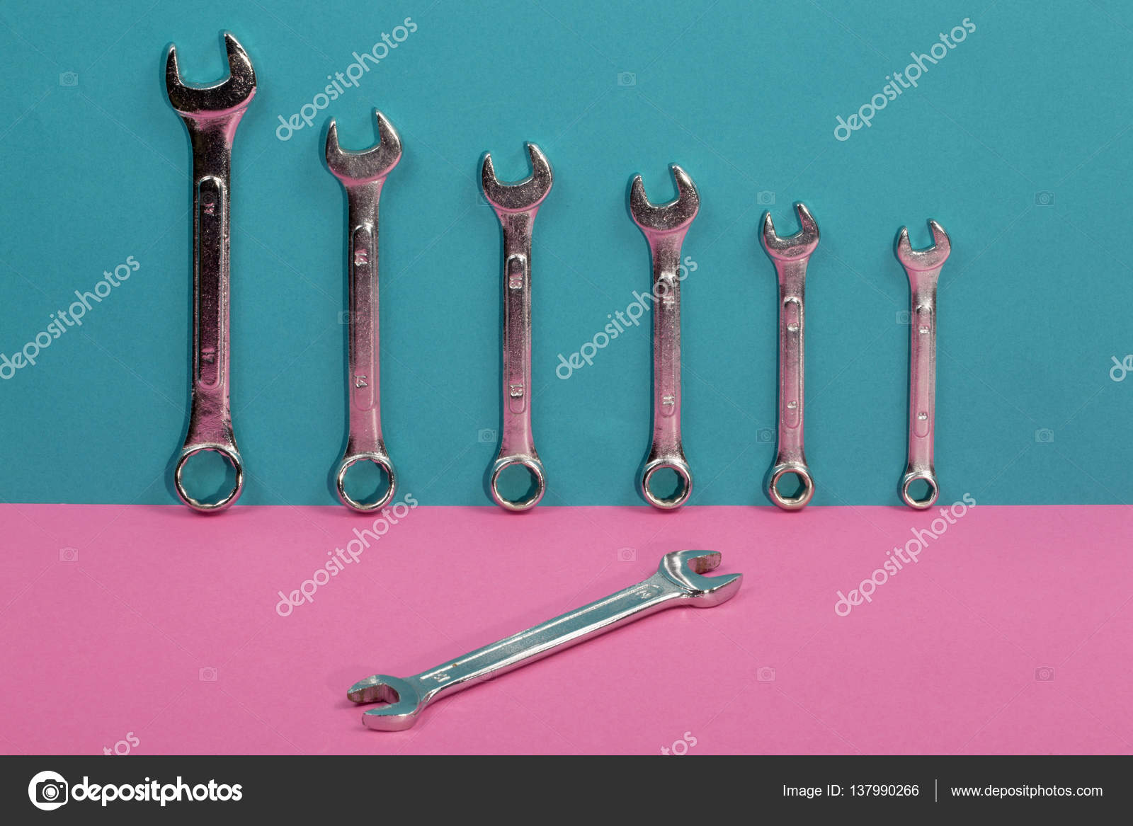 depositphotos_137990266-stock-photo-seven-wrenches-on-a-colored.jpg