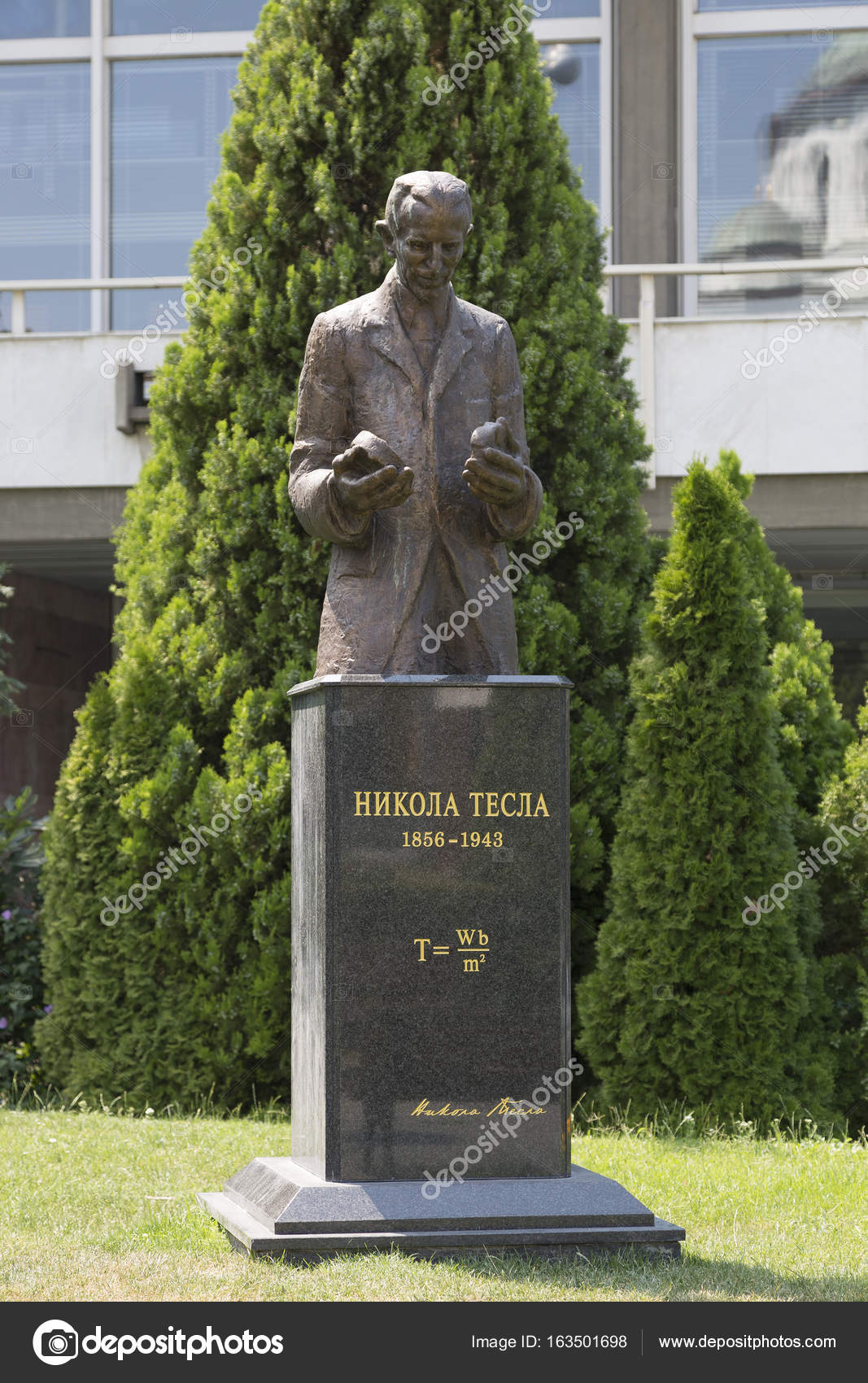 Monument to Nicolas Tesla in Belgrade near the building of the National Library of ...