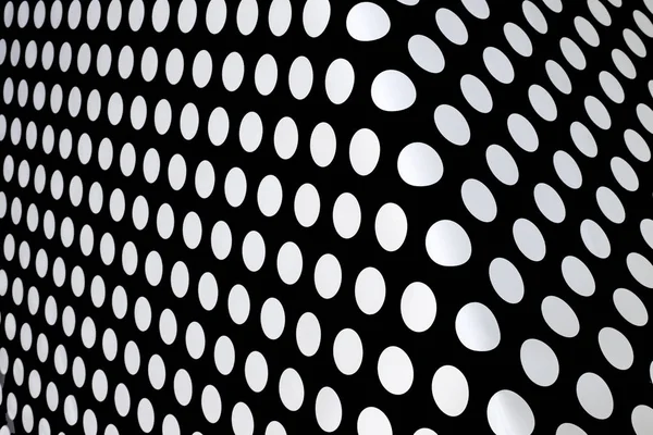 黒い背景に白い円を繰り返し抽象的な背景 — ストック写真