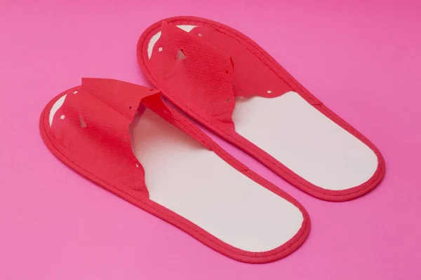 Red One Slippers Hotel Pink Background — Stock Photo, Image