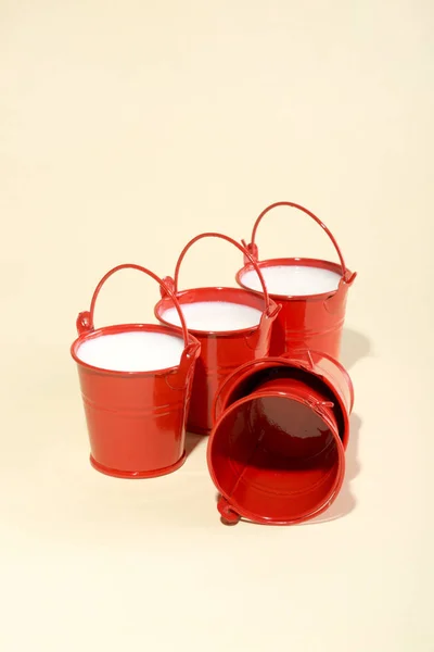 Red Buckets Milk Yellow Background — Stock Photo, Image