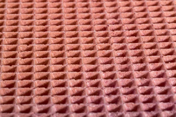 ピンク色のお菓子ワッフルの背景や表面の質感 — ストック写真