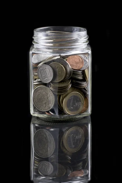 Monedas Frasco Vidrio Sobre Fondo Negro — Foto de Stock