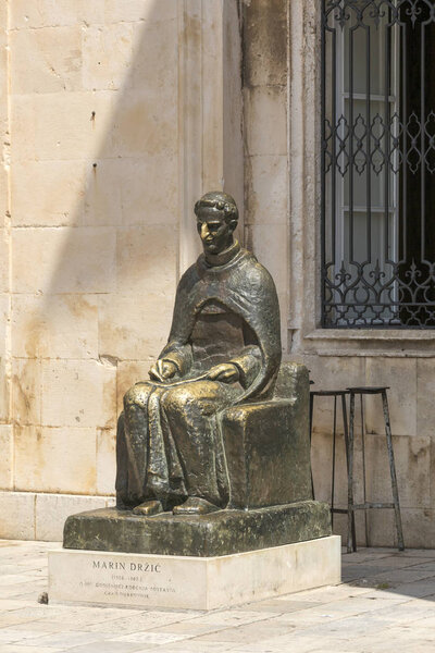 Dubrovnik, Croatia - August 06, 2017: Statue of Marin Drzhich in front of the rector's Palace