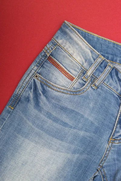 Fragment Shabby Jeans Light Blue Red Background — Stock Photo, Image