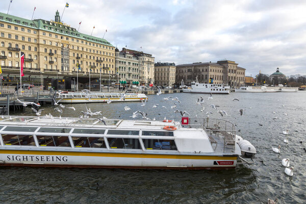 Stockholm, Sweden - January 16, 2020: Quay for ships on the promenade in the center of Stockholm.