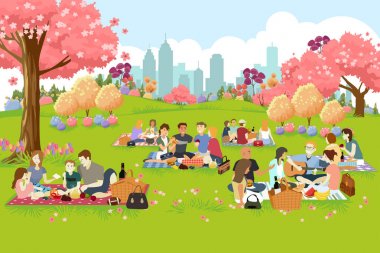 İnsanlar piknik parkta bahar döneminde