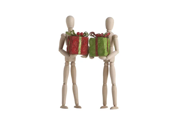 Deux mannequin en bois tenant cadeau de Noël — Photo