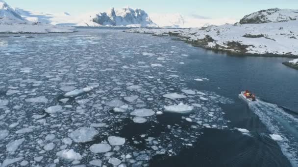 Zodiac boat in Antarctica ocean aerial shot — Stock Video