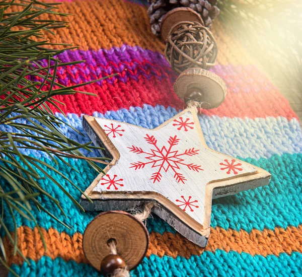 Jul dekoration snöflinga på ylle bakgrund — Stockfoto