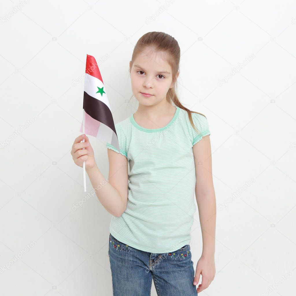 Teen girl holding Syria flag