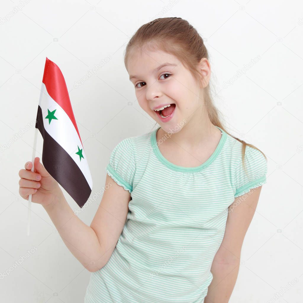 Teen girl holding Syria flag