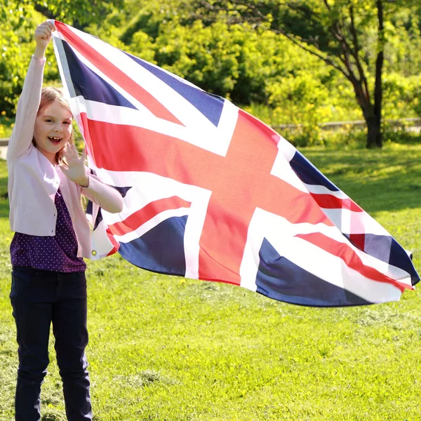 Niño encantador y bandera — Foto de Stock