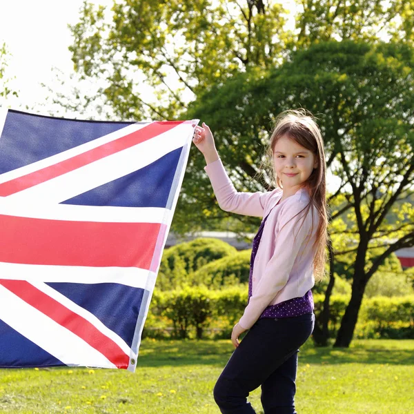 Niño encantador y bandera —  Fotos de Stock