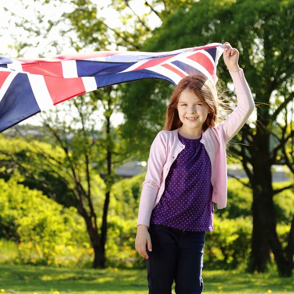 Piękne dziecko i flagi — Zdjęcie stockowe