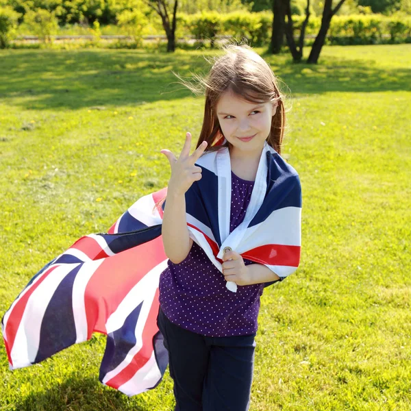 Piękne dziecko i flagi — Zdjęcie stockowe