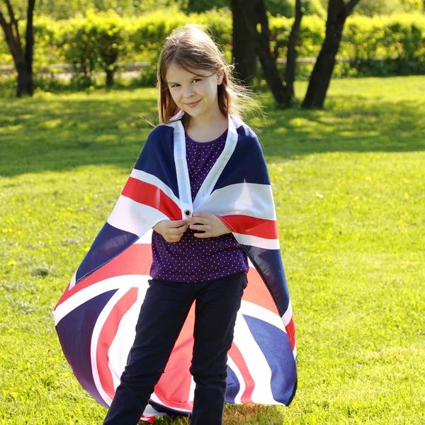 Niño encantador y bandera — Foto de Stock