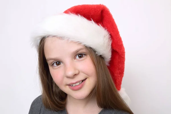 Buźkę Dziewczynki Santa Hat — Zdjęcie stockowe