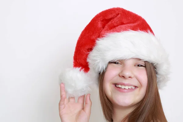 Teen Girl Santa Hat Pozowanie Kamerę — Zdjęcie stockowe